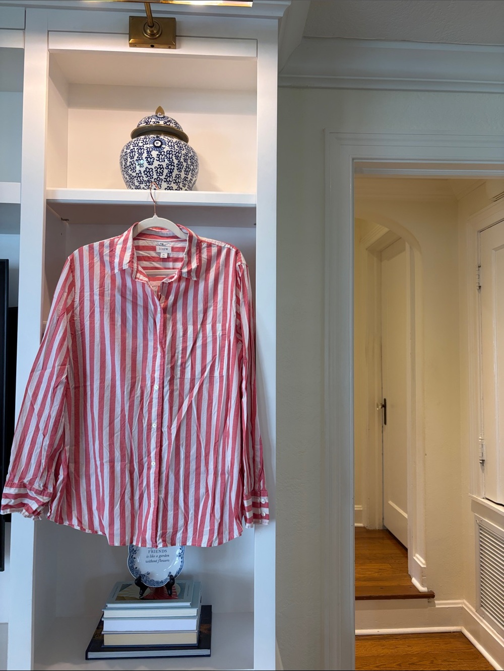 JCrew soft red and white striped long sleeve button down collared blouse.